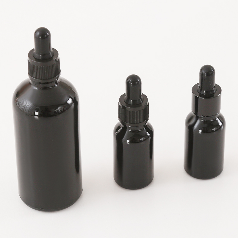 Botella de aceite esencial de vidrio negro