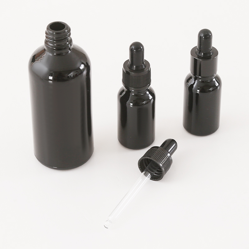 Botella de aceite esencial de vidrio negro