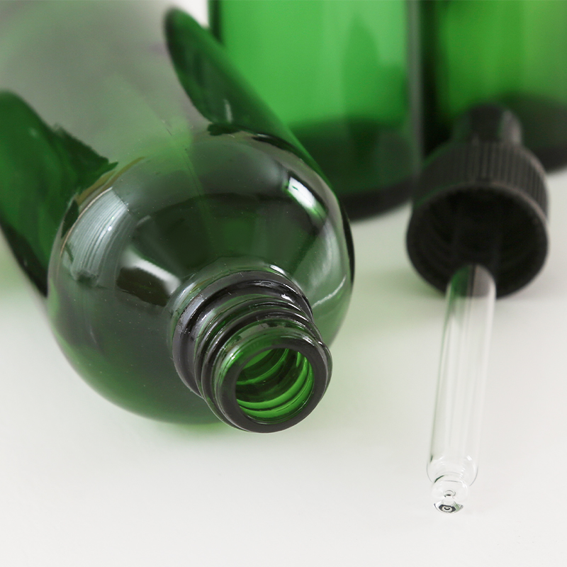 Botella de aceite esencial de vidrio verde Botella de aceite esencial de vidrio verde