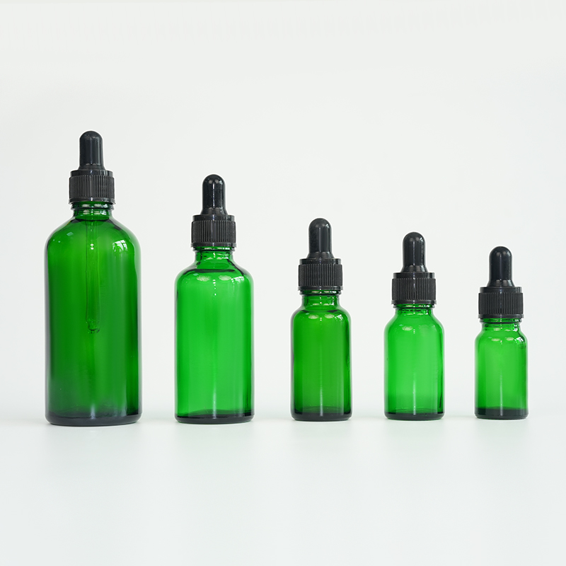 Botella de aceite esencial de vidrio verde