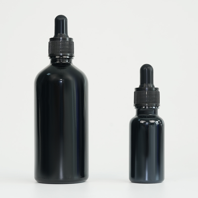 Botella de aceite esencial de vidrio negro