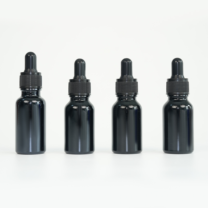 Botella de aceite esencial de vidrio negro