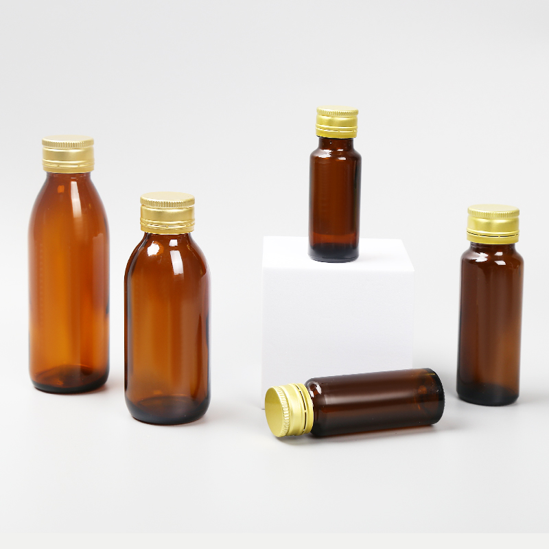 Botella de líquido oral de vidrio ámbar con cuello roscado