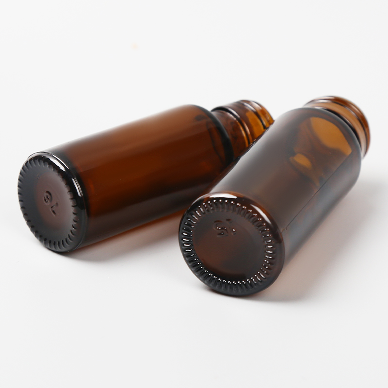 Botella de líquido oral de vidrio ámbar con cuello roscado